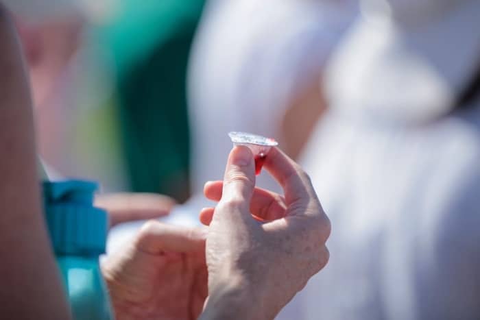 Pre filled communion cup with wafer